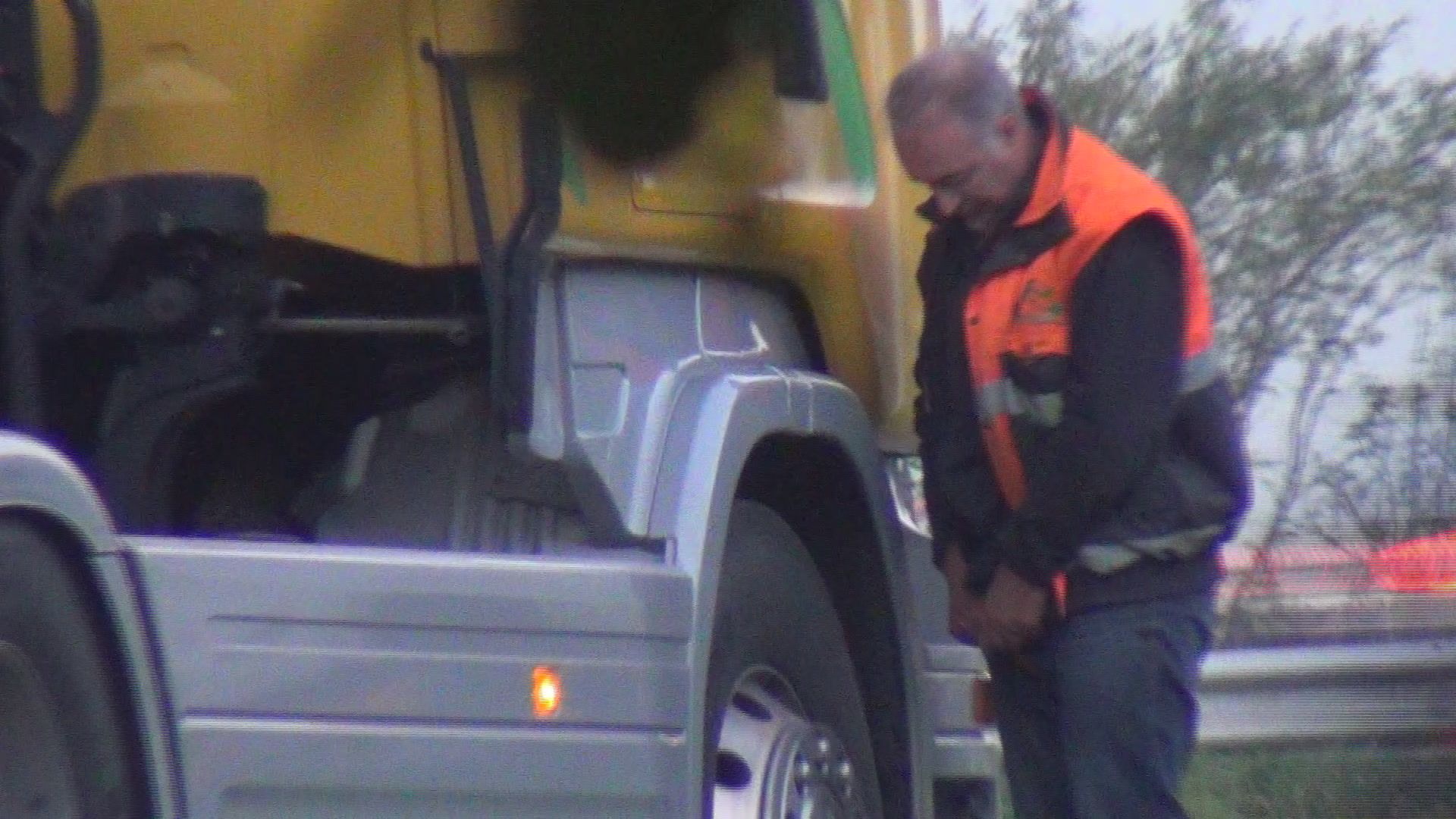 Trucker caught spying while peeing images