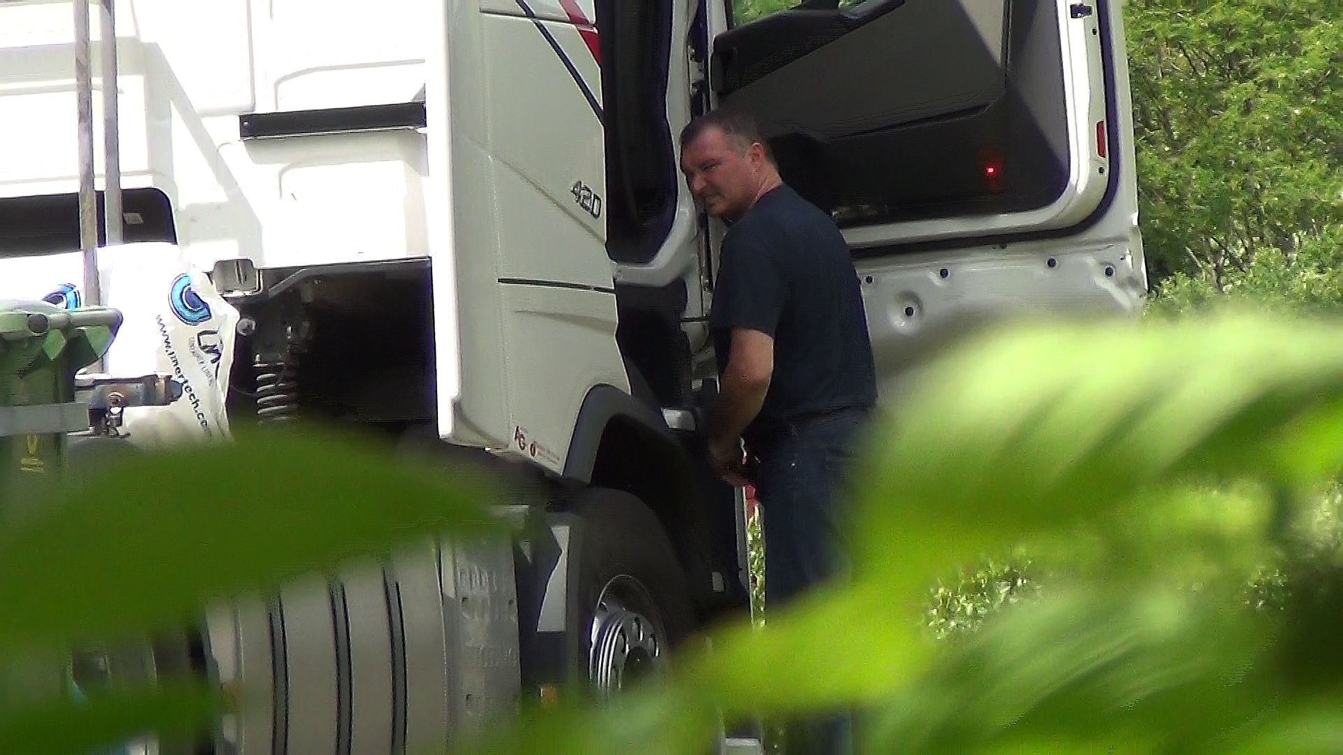 Trucker caught spying while peeing images